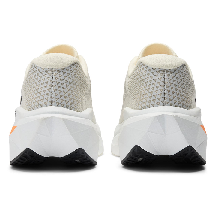 New Balance FuelCell SuperComp Trainer 3 men’s in Angora and Hot Mango and Black, pair viewed from behind 