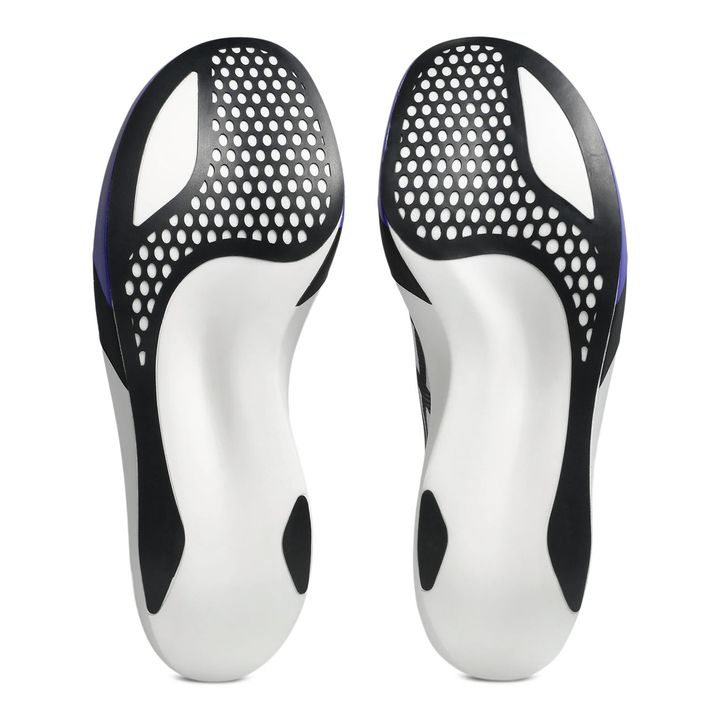 ASICS MetaSpeed Ray in White and Cobalt Burst, pair of outsoles 