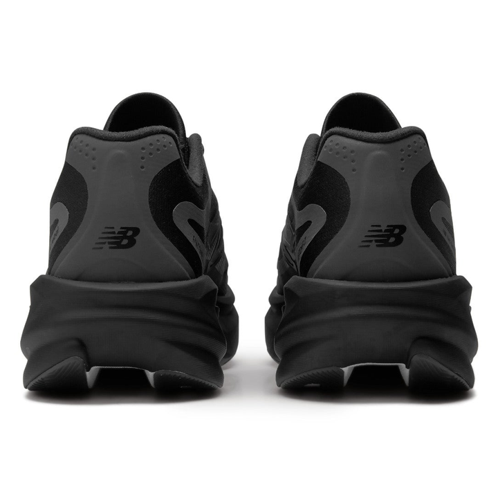 New Balance SuperComp Rebel men’s in Black and Magnet, pair viewed from behind 