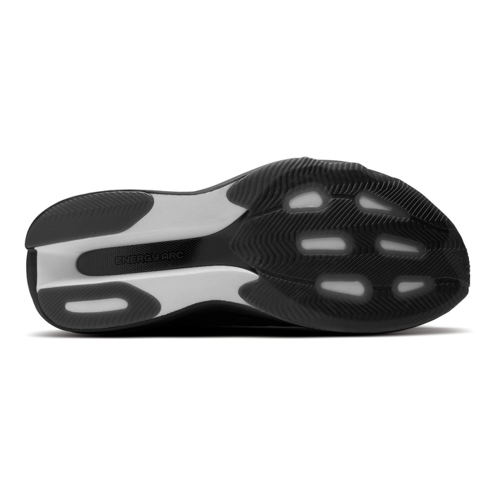 New Balance SuperComp Rebel men’s in Black and Magnet, right shoe outsole 